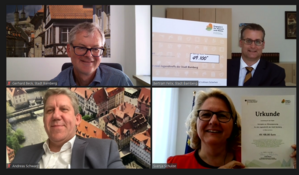 Glückliche Gesichter bei der ersten digitalen Fördergeldübergabe in Bamberg